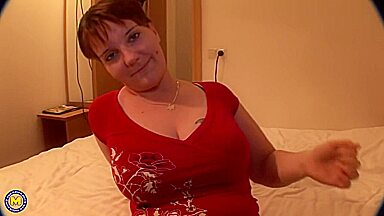 Angela J. in Big breasted mature slut sucking cock